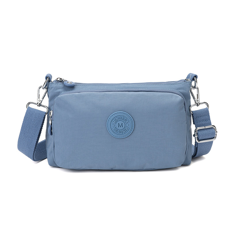 Mini Essentials sling – Compact Everyday Sling Bag