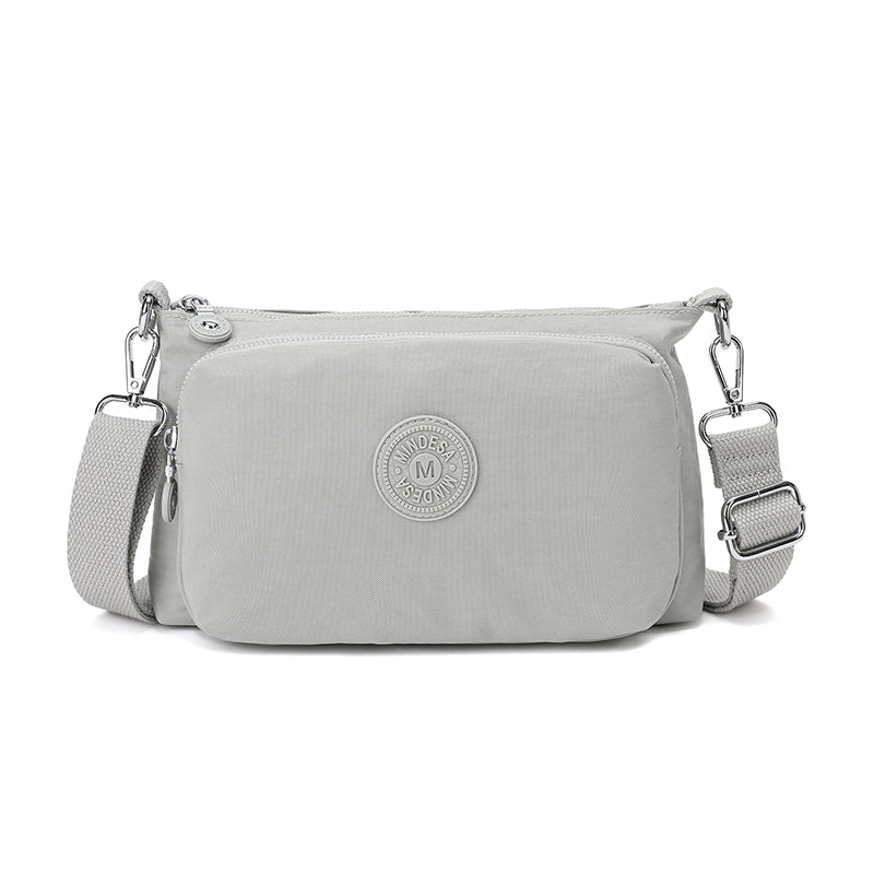 Mini Essentials sling – Compact Everyday Sling Bag