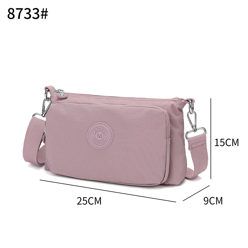 Mini Essentials sling – Compact Everyday Sling Bag